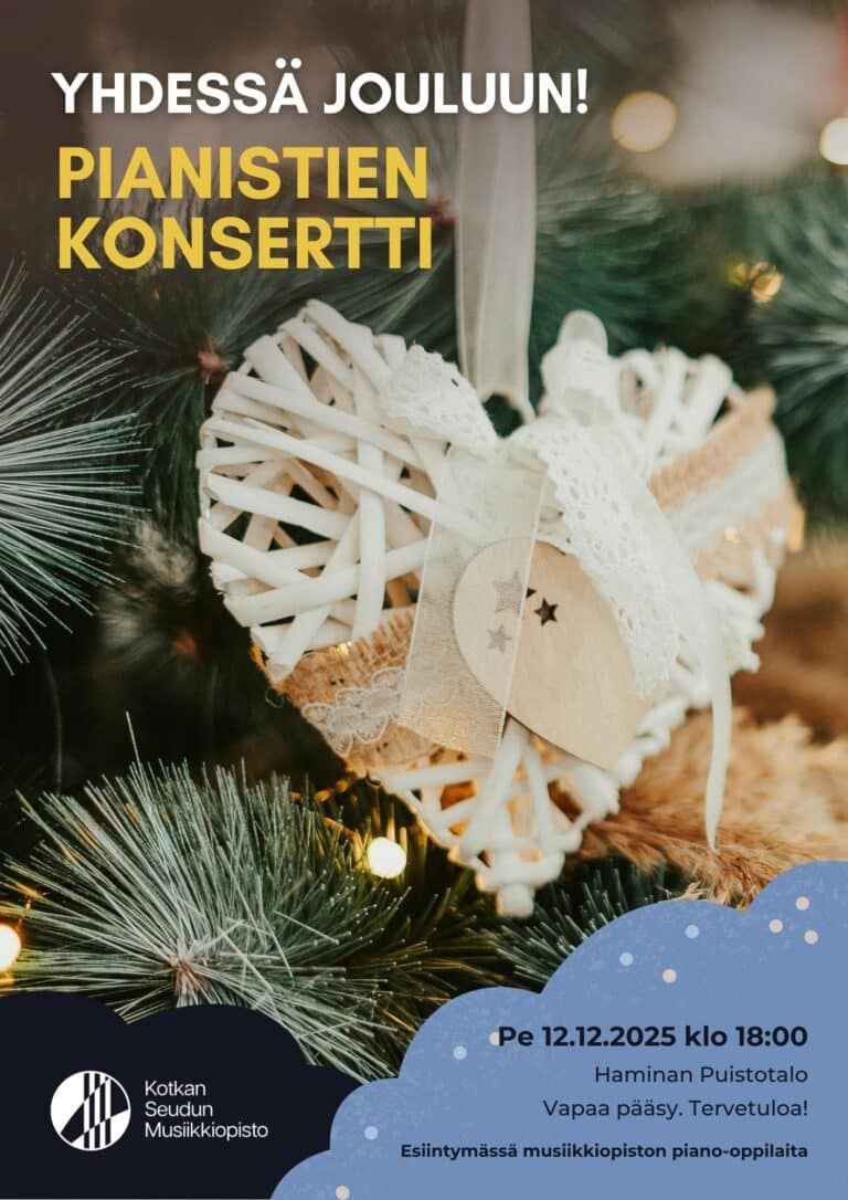 valkoinen sydänkoriste roikkuu joulukuusessa